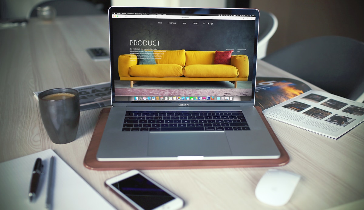 Clean developer workspace with open laptop, representing the planning phase of a headless ecommerce build